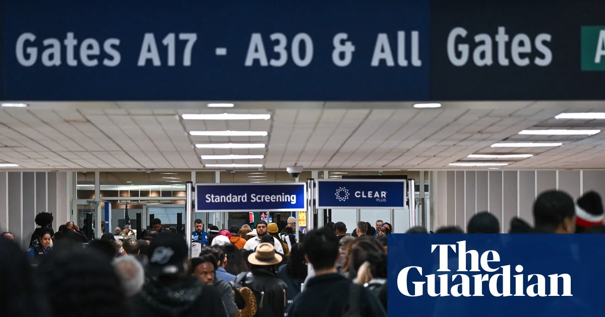 Travelers in US continue to face delays at airport security amid DHS shutdown | US news