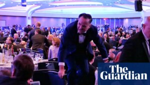 The moment gunshots were heard during White House correspondents' dinner – video